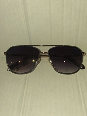 Guess GU00046 sunglasses featuring a black and silver metal aviator frame